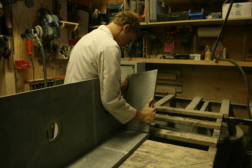 Greg Seuren putting the side on a soapstone sink